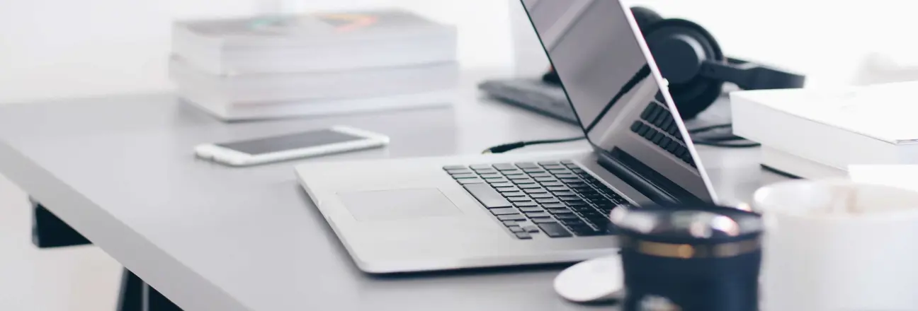 mac laptop on desk