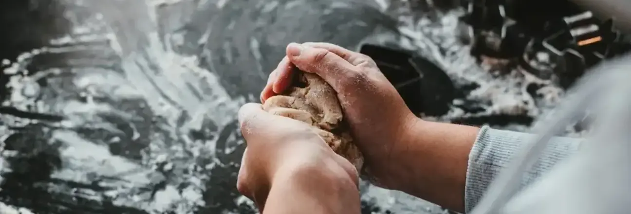 Rolling out dough on table